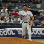 Sep 12, 2024; Bronx, New York, USA; Boston Red Sox third baseman Rafael Devers (11) throws out New York Yankees shortstop Anthony Volpe (not pictured) after fielding a ground ball during the ninth inning at Yankee Stadium. Mandatory Credit: Gregory Fisher-Imagn Images