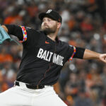 Sep 20, 2024; Baltimore, Maryland, USA; Baltimore Orioles pitcher Danny Coulombe (54) throws a eighth inning pitch against the Detroit Tigers at Oriole Park at Camden Yards. Mandatory Credit: Tommy Gilligan-Imagn Images