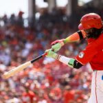 Sep 21, 2024; Cincinnati, Ohio, USA; Cincinnati Reds shortstop Elly De La Cruz (44) hits a double in the third inning against the Pittsburgh Pirates at Great American Ball Park. Mandatory Credit: Katie Stratman-Imagn Images