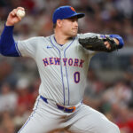 Sep 24, 2024; Atlanta, Georgia, USA; New York Mets relief pitcher Adam Ottavino (0) throws against the Atlanta Braves in the seventh inning at Truist Park. Mandatory Credit: Brett Davis-Imagn Images