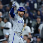 Oct 7, 2024; Bronx, New York, USA; Kansas City Royals outfielder Tommy Pham (22) reacts after a RBI single against the New York Yankees in the fourth inning during game two of the ALDS for the 2024 MLB Playoffs at Yankee Stadium. Mandatory Credit: Brad Penner-Imagn Images