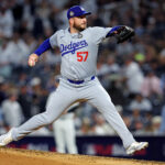Oct 30, 2024; New York, New York, USA; Los Angeles Dodgers pitcher Ryan Brasier (57) pitches during the third inning against the New York Yankees in game four of the 2024 MLB World Series at Yankee Stadium. Mandatory Credit: Brad Penner-Imagn Images