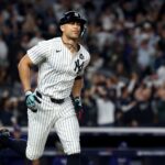 Oct 30, 2024; New York, New York, USA; New York Yankees designated hitter Giancarlo Stanton (27) reacts after hitting a home run during the third inning against the Los Angeles Dodgers in game five of the 2024 MLB World Series at Yankee Stadium. Mandatory Credit: Vincent Carchietta-Imagn Images