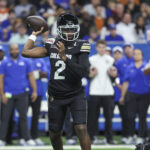Dec 28, 2024; San Antonio, TX, USA; Colorado Buffaloes quarterback Shedeur Sanders (2) attempts a pass during the first quarter against the Brigham Young Cougars at Alamodome. Mandatory Credit: Troy Taormina-Imagn Images