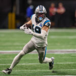 Jan 5, 2025; Atlanta, Georgia, USA; Carolina Panthers wide receiver Adam Thielen (19) runs after a catch against the Atlanta Falcons in overtime at Mercedes-Benz Stadium. Mandatory Credit: Brett Davis-Imagn Images