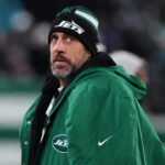 Jan 5, 2025; East Rutherford, New Jersey, USA; New York Jets quarterback Aaron Rodgers (8) during the third quarter of their game against the Miami Dolphins at MetLife Stadium. Mandatory Credit: Ed Mulholland-Imagn Images