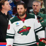Jan 20, 2025; Denver, Colorado, USA; Minnesota Wild right wing Ryan Hartman (38) before the game against the Colorado Avalanche at Ball Arena. Mandatory Credit: Ron Chenoy-Imagn Images