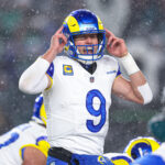 Jan 19, 2025; Philadelphia, Pennsylvania, USA; Los Angeles Rams quarterback Matthew Stafford (9) calls a play at the one of scrimmage against the Philadelphia Eagles in a 2025 NFC divisional round game at Lincoln Financial Field.