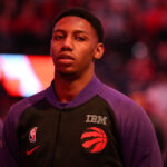 Jan 21, 2025; Toronto, Ontario, CAN; Toronto Raptors forward RJ Barrett (9) stands during the playing of national anthems before tip off against the Orlando Magic at Scotiabank Arena. Mandatory Credit: Dan Hamilton-Imagn Images