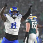Jan 19, 2025; Philadelphia, Pennsylvania, USA; Los Angeles Rams linebacker Jared Verse (8) reacts after a play against the Philadelphia Eagles in a 2025 NFC divisional round game at Lincoln Financial Field.