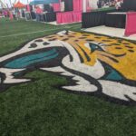 Donna Marathon Expo booths surround the Jacksonville Jaguars logo inside the Daily's Place flex field on Jan. 31, 2025. [Clayton Freeman/Florida Times-Union]