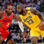 Feb 4, 2025; Inglewood, California, USA; NBA; Los Angeles Lakers forward LeBron James (23) moves the ball against Los Angeles Clippers forward Kawhi Leonard (2) during the second half at Intuit Dome.