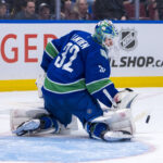 Feb 8, 2025; Vancouver, British Columbia, CAN; Vancouver Canucks goalie Kevin Lankinen (32) makes a save against the Toronto Maple Leafs in the third period at Rogers Arena. Mandatory Credit: Bob Frid-Imagn Images