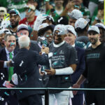 Feb 9, 2025; New Orleans, LA, USA; Philadelphia Eagles owner Jeffrey Lurie passes the Vince Lombardi Trophy to Philadelphia Eagles quarterback Jalen Hurts (1) after defeating the Kansas City Chiefs in Super Bowl LIX at Ceasars Superdome. Mandatory Credit: Stephen Lew-Imagn Images - NFL Draft
