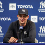 Feb 13, 2025; Tampa, FL, USA; New York Yankees manager Aaron Boone (17) gives a press conference during spring training workouts at George M. Steinbrenner Field. Mandatory Credit: Nathan Ray Seebeck-Imagn Images