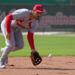 Feb 17, 2025; Jupiter, FL, USA; St. Louis Cardinals third base Nolan Arenado (28) takes infield practice at spring training. Mandatory Credit: Jim Rassol-Imagn Images Nolan Arenado
