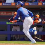 Feb 22, 2025; Port St. Lucie, Florida, USA; New York Mets outfielder Juan Soto (22) hits a home run in his first at-bat for the Mets against the Houston Astros in the first inning at Clover Park.