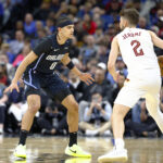 Feb 25, 2025; Orlando, Florida, USA; Orlando Magic guard Anthony Black (0) guards Cleveland Cavaliers guard Ty Jerome (2) during the first half at Kia Center.