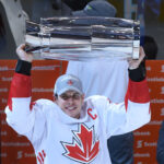 Sep 29, 2016; Toronto, Ontario, Canada; Team Canada center Sidney Crosby (87) hoists the World Cup of Hockey championship trophy after game two of the World Cup of Hockey final against Team Europe at Air Canada Centre. Mandatory Credit: Dan Hamilton-USA TODAY Sports