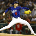 GLENDALE, ARIZONA - MARCH 4: Roki Sasaki #11 of the Los Angeles Dodgers throws a pitch in the fifth inning during a spring training game against the Cincinnati Reds at Camelback Ranch on March 4, 2025 in Glendale, Arizona. (Photo by Brandon Sloter/Getty Images)