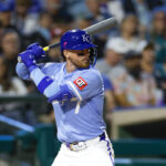 SURPRISE, ARIZONA - MARCH 5: Bobby Witt Jr. #7 of the Kansas City Royals waits for a pitch in the fourth inning during a spring training game against the Seattle Mariners at Surprise Stadium on March 5, 2025 in Surprise, Arizona. (Photo by Brandon Sloter/Getty Images)
