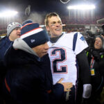 Jan 20, 2019; Kansas City, MO, USA; New England Patriots head coach Bill Belichick and quarterback Tom Brady (12) celebrate the win over the Kansas City Chiefs during overtime in the AFC Championship game at Arrowhead Stadium. Mandatory Credit: Kirby Lee-USA TODAY Sports