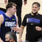 Apr 21, 2021; Dallas, Texas, USA; Dallas Mavericks guard Luka Doncic (77) laughs with owner Mark Cuban after the game against the Detroit Pistons at American Airlines Center.