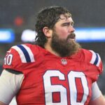 Dec 3, 2023; Foxborough, Massachusetts, USA; New England Patriots center David Andrews (60) walks off of the field after a game against the Los Angeles Chargers at Gillette Stadium. Mandatory Credit: Brian Fluharty-USA TODAY Sports