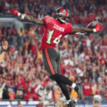 Jan 15, 2024; Tampa, Florida, USA; Tampa Bay Buccaneers wide receiver Chris Godwin (14) celebrates his touchdown against the Philadelphia Eagles during the second half of a 2024 NFC wild card game at Raymond James Stadium. Mandatory Credit: Kim Klement Neitzel-USA TODAY Sports