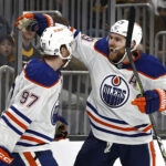 Mar 5, 2024; Boston, Massachusetts, USA; Edmonton Oilers center Leon Draisaitl (29) celebrates his game winning overtime goal with teammate center Connor McDavid (97) against the Boston Bruins at TD Garden. Mandatory Credit: Winslow Townson-USA TODAY Sports