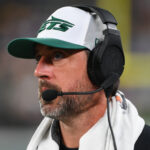 Aug 24, 2024; East Rutherford, New Jersey, USA; New York Jets quarterback Aaron Rodgers (8) looks on against the New York Giants during the second half at MetLife Stadium. Mandatory Credit: Rich Barnes-USA TODAY Sports