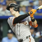 Sep 20, 2024; Kansas City, Missouri, USA; San Francisco Giants first baseman Mark Canha (16) bats during the first inning against the Kansas City Royals at Kauffman Stadium.