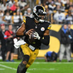 Oct 6, 2024; Pittsburgh, Pennsylvania, USA; Pittsburgh Steelers quarterback Justin Fields (2) scrambles against the Dallas Cowboys during the first quarter at Acrisure Stadium. Mandatory Credit: Barry Reeger-Imagn Images
