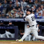 Oct 30, 2024; New York, New York, USA; New York Yankees outfielder Alex Verdugo (24) hits an RBI single during the second inning against the Los Angeles Dodgers in game four of the 2024 MLB World Series at Yankee Stadium. Mandatory Credit: Brad Penner-Imagn Images