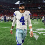 Nov 3, 2024; Atlanta, Georgia, USA; Dallas Cowboys quarterback Dak Prescott (4) walks off the field after a game against the Atlanta Falcons at Mercedes-Benz Stadium.