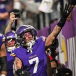 Nov 3, 2024; Minneapolis, Minnesota, USA; Minnesota Vikings cornerback Byron Murphy Jr. (7) reacts with the crowd after an interception off Indianapolis Colts quarterback Joe Flacco (not pictured) during the third quarter at U.S. Bank Stadium. Mandatory Credit: Jeffrey Becker-Imagn Images