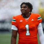 Nov 9, 2024; Atlanta, Georgia, USA; Miami Hurricanes quarterback Cam Ward (1) on the sideline against the Georgia Tech Yellow Jackets in the first quarter at Bobby Dodd Stadium at Hyundai Field. Mandatory Credit: Brett Davis-Imagn Images
