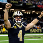 Nov 17, 2024; New Orleans, Louisiana, USA; New Orleans Saints quarterback Derek Carr (4) reacts after tight end Taysom Hill (not pictured) scores a touchdown against the Cleveland Browns during the second half at Caesars Superdome. Mandatory Credit: Stephen Lew-Imagn Images