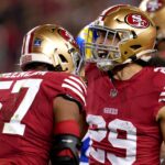 Dec 12, 2024; Santa Clara, California, USA; San Francisco 49ers linebacker Dre Greenlaw (57) is congratulated by safety Talanoa Hufanga (29) after making a tackle against the Los Angeles Rams in the first quarter at Levi's Stadium.