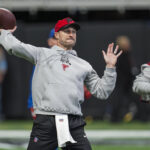 Dec 22, 2024; Atlanta, Georgia, USA; Atlanta Falcons quarterback Kirk Cousins (18) warms up on the field prior to the game against the New York Giants at Mercedes-Benz Stadium.