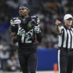 NFL Draftr 2025 prospect Travis Hunter - Dec 28, 2024; San Antonio, TX, USA; Colorado Buffaloes wide receiver Travis Hunter (12) reacts after a penalty is called during the second quarter against the Brigham Young Cougars at Alamodome. Mandatory Credit: Troy Taormina-Imagn Images