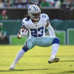 Dec 29, 2024; Philadelphia, Pennsylvania, USA; Dallas Cowboys running back Rico Dowdle (23) against the Philadelphia Eagles at Lincoln Financial Field.