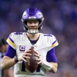 Jan 13, 2025; Glendale, AZ, USA; Minnesota Vikings quarterback Sam Darnold (14) against the Los Angeles Rams during an NFC wild card game at State Farm Stadium.
