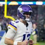 Jan 13, 2025; Glendale, AZ, USA; Minnesota Vikings quarterback Daniel Jones (13) against the Los Angeles Rams during an NFC wild card game at State Farm Stadium. Mandatory Credit: Mark J. Rebilas-Imagn Images