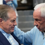 Jan 18, 2025; Chapel Hill, North Carolina, USA; North Carolina Tar Heels head football coach Bill Belichick with former Tar Heels basketball coach Roy Williams before the game at Dean E. Smith Center. Mandatory Credit: Bob Donnan-Imagn Images