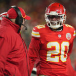 Jan 18, 2025; Kansas City, Missouri, USA; Kansas City Chiefs head coach Andy Reid (left) talks with safety Justin Reid (20) during the fourth quarter of a 2025 AFC divisional round game against the Houston Texans at GEHA Field at Arrowhead Stadium. Mandatory Credit: Jay Biggerstaff-Imagn Images