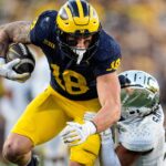NFL Draft 2025 TEs - KANSAS CITY CHIEFS: Michigan tight end Colston Loveland (18) makes a catch against Oregon defensive back Kobe Savage (5) during the second half at Michigan Stadium in Ann Arbor on Saturday, Nov. 2, 2024.