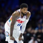 Mar 1, 2025; Philadelphia, Pennsylvania, USA; Philadelphia 76ers forward Paul George (8) looks on against the Golden State Warriors during the second quarter at Wells Fargo Center.