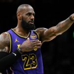 Mar 8, 2025; Boston, Massachusetts, USA; Los Angeles Lakers forward LeBron James (23) calls a play against the Boston Celtics during the second quarter at the TD Garden.