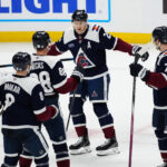 Mar 10, 2025; Denver, Colorado, USA; Colorado Avalanche center Nathan MacKinnon (29) celebrates an assist with center Martin Necas (88) and defenseman Devon Toews (7) and defenseman Cale Makar (8) in the third period against the Chicago Blackhawks at Ball Arena. Mandatory Credit: Ron Chenoy-Imagn Images